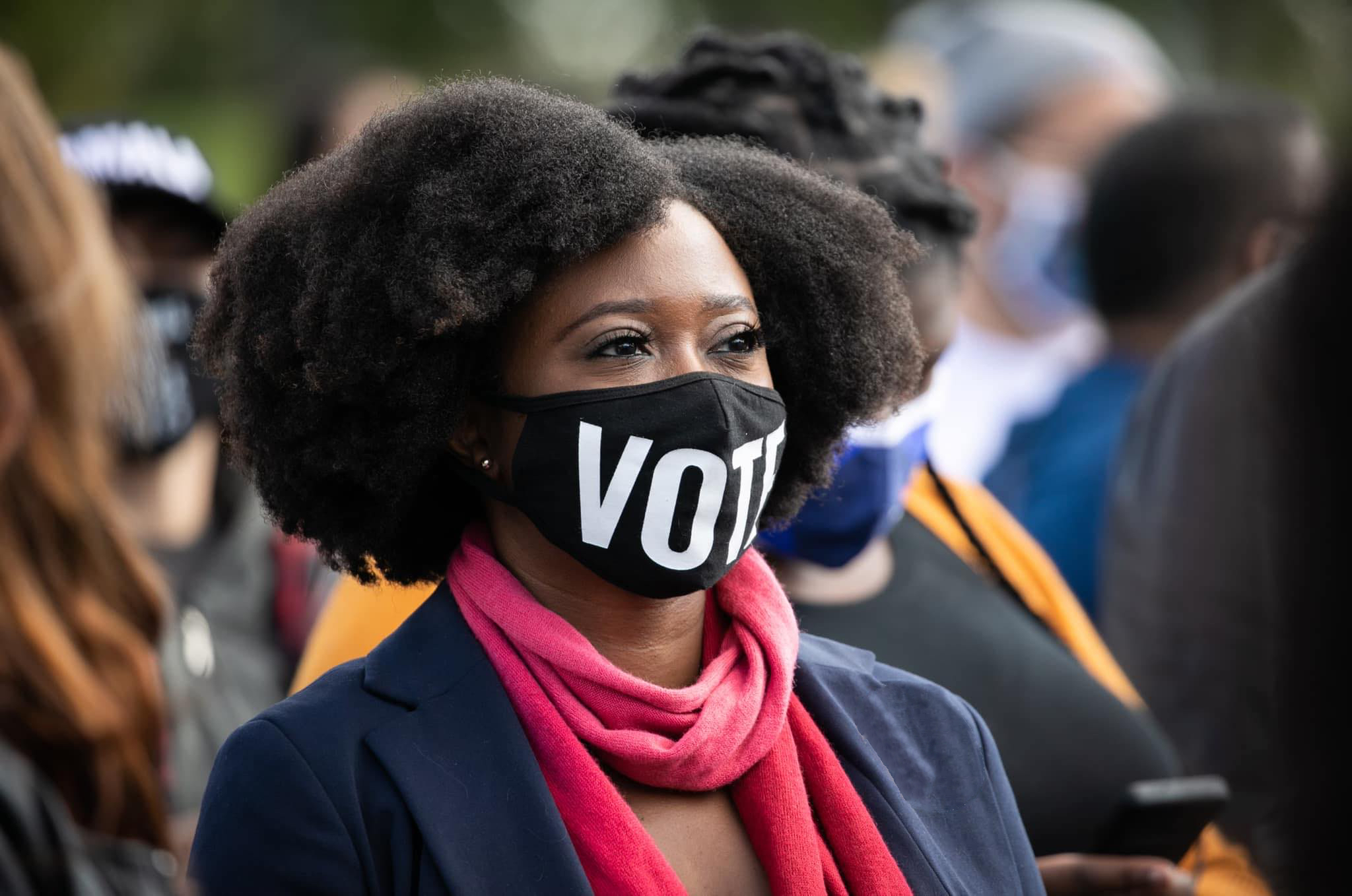 Ashley Nealy (NLC Atlanta), wearing a mask that says vote.